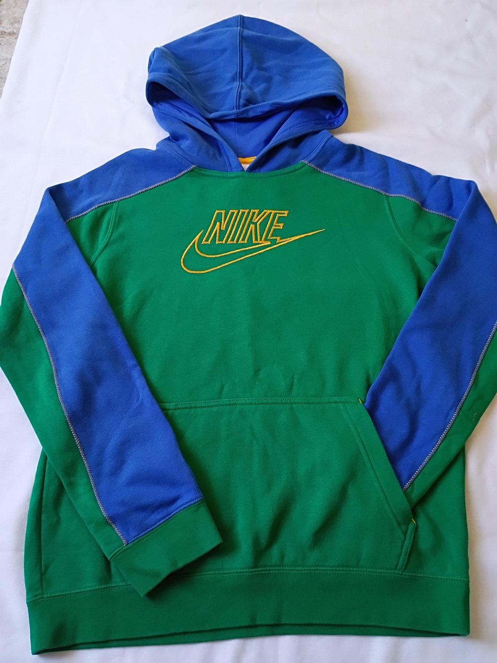 Nike Boys Green Hoodie with Blue Sleeves and Yellow Logo Size XL.